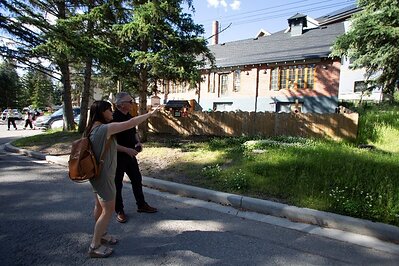 Ebony Rempel and Minister Heath MacDonald in front of Puzzles Child Care facility on site with room for up to 24 children.