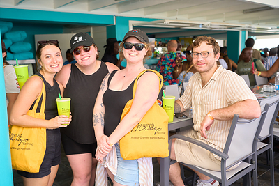 Nevis Mango Festival Passport Food Tour guests at “On the Rocks”.