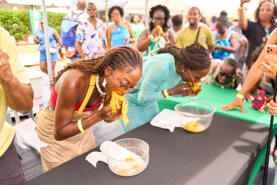 Francesca Murray at the Mango Eating Competition at the Nevis Mango Festival's Mango Mania.