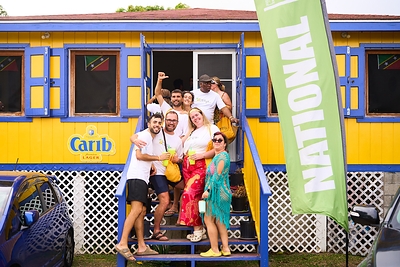 Festival Attendees pose for a photo at the Nevis Mango Festival Passport Food Tour.