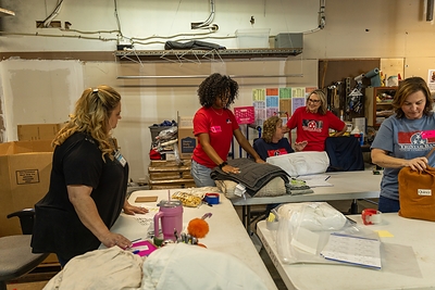 TriStar Bank employees sort bedding at Habitat for Humanity Restore during a Day of Service Friday, June 19, 2026. 