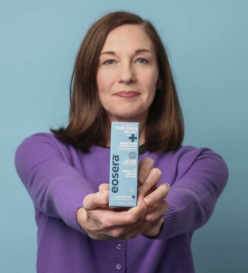 Elyse Stoltz Dickerson holds a box of EAR PAIN MD® +PLUS, a newly released earache relief product that contains Thymol to protect against infection. Dickerson was named a Tory Burch Foundation Fellow in 2026, and continues to lead the company she founded in 2015, serving as CEO. From the first product — EAR WAX MD® — to more than 20 products available at 28,000 stores around the nation, Dickerson has shepherded eosera® through countless innovative product launches. Elyse Stoltz Dickerson holds a box of EAR PAIN MD® +PLUS, a newly released earache relief product that contains Thymol to protect against infection. Dickerson was named a Tory Burch Foundation Fellow in 2026, and continues to lead the company she founded in 2015, serving as CEO. From the first product — EAR WAX MD® — to more than 20 products available at 28,000 stores around the nation, Dickerson has shepherded eosera® through countless innovative product launches.