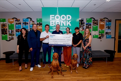 (left to right) Michelle Karajelian, corporate social responsibility, Hyundai Motor North America, Brandon Ramirez, director, corporate social responsibility, Hyundai Motor North America, Gary Rome, president, Gary Rome Auto Group, Andrew Morehouse, executive director, Food Bank of Western Massachusetts, Cheyenne Burnham, public engagement manager, Food Bank of Western Massachusetts, Vanessa Perez, corporate social responsibility, Hyundai Motor North America, Lori Chatel, executive assistant, Gary Rome Auto Group at the Food Bank of Western Massachusetts in Chicopee, Mass., on July 17, 2026 (Photo/Hyundai)