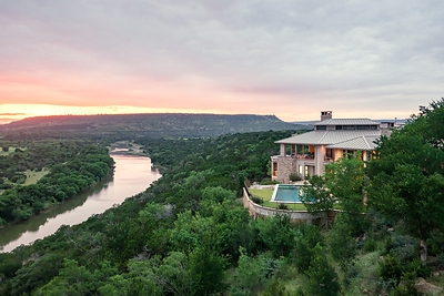 For sale: The exceptional Rio Vista Brazos ranch in Palo Pinto County, Texas, with architectural main home, resort pool, barn, boundless recreational pursuits, dramatic topography, rare Brazos River frontage and big, bold, sweeping views. It is represented by the award-winning Burgher-Ray Ranch Group at Briggs Freeman Sotheby's International Realty in Dallas for $7,995,000.