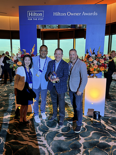 Buffalo Lodging's Team with Award