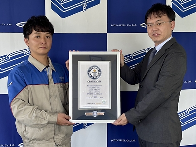 TOYO STEEL receiving its Guinness World Records™ certificate for the "Most licensed branded versatile box series."