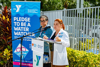 Malvina Duncan, RN, Nicklaus Children’s Hospital Injury Prevention Coordinator & SAFE KIDS Miami-Dade Coordinator (right), along Laurie Garcia, RN, MSN, Nurse Manager, PICU at Nicklaus Children's Hospital Fort Lauderdale (left), address the media during a press conference about water safety at the L.A. Lee YMCA/Mizell Community Center on Wednesday, July 22, 2026 in Fort Lauderdale, Florida.