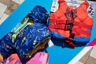U.S. Coast Guard-approved life vest displayed during the press conference about water safety at the L.A. Lee YMCA/Mizell Community Center on Wednesday, July 22, 2026, in Fort Lauderdale, Florida.