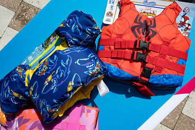 U.S. Coast Guard-approved life vest displayed during the press conference about water safety at the L.A. Lee YMCA/Mizell Community Center on Wednesday, July 22, 2026, in Fort Lauderdale, Florida.