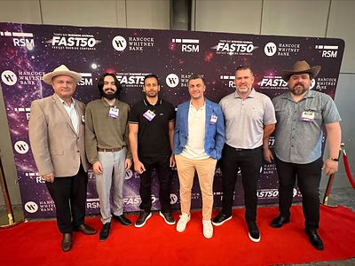 Co-Founder Naim Hamdar with the Payzli team