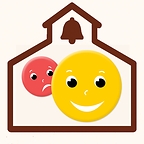 The Smiles & Frowns app icon: a smile face in front of a frown face, both with the outline of a classic schoolhouse.