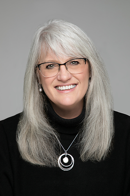 April Bettinger, Founder and CEO of Nip Tuck Remodeling, an award-winning women-owned design-build firm serving homeowners across Seattle's Eastside.