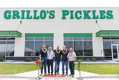 From left, Dustin Etchison (Grillo's Pickles Indiana General Manager), John Linehan (IFG President & Board Director), Bill Russell (Grillo's Pickles Chief Operating Officer), Adam Kaufman (Grillo's Pickles President & CEO) and Mark Taira (King's Hawaiian CEO) celebrate the grand opening of the new Grillo's Pickles production facility in Bartholomew County, Indiana.