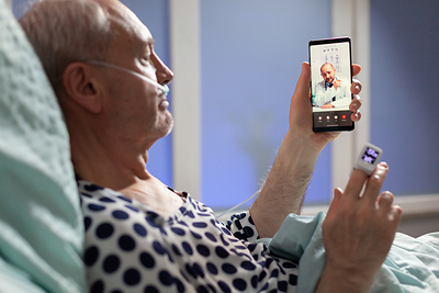 Patient getting an on-demand psychiatric consult from his hospital bed.