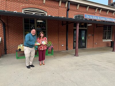 Matt Umstead, board chair of the Berkeley County Roundhouse Authority, and Aubrey Ervin, board member at For the Kids, by George Children's Museum