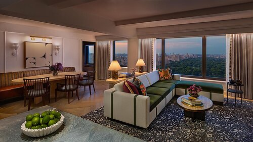 View of Central Park at dusk from the parlor of the Promenade Suite on the 38th floor of the JW Marriott Essex House New York.