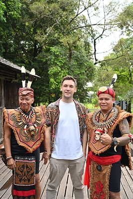 'AXN Ultimate Challenge Sarawak' host Mark O'Dea with Bidayuh Blowpipe Masters.