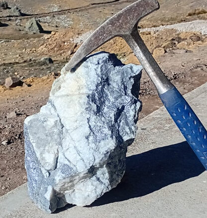 PHOTO 1 - Grab sample of high-grade molybdenite in quartz, Janchiscocha - Level 4464.
