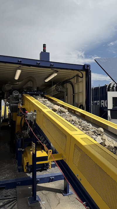 Sample material from Perpetua Resources enters the modular mineral processing plant. Sample material from Perpetua Resources enters the modular mineral processing plant.