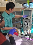 Andre Shih, DVM, ACVECC, ACVAA, and Christopher Toney with a dialysis patient at Dogwood Veterinary Specialty and Emergency. Dialysis can be life-saving in the most severe heatstroke and toxin cases.