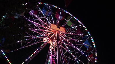 A 65-foot Ferris wheel overlooking Georgian Bay, lights up the night sky at the Memories of Summer festival.