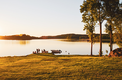 A day on the water winds down as family and friends gather lakeside at sunset. (Photo courtesy of Discover Boating)