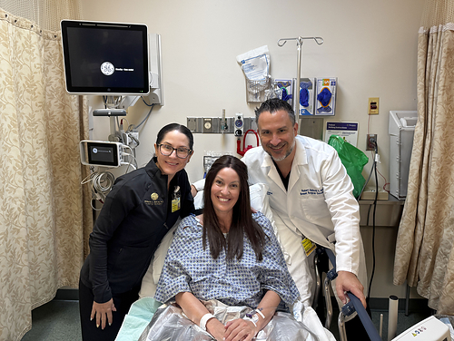 Dr. Melanie L. Aya-Ay, plastic surgeon, and Dr. Robert Gabordi, breast surgical oncologist and medical director of BayCare’s St. Joseph’s Hospitals breast surgery program, with Kimberley Kirtley on July 29, 2026. Kimberly is the first patient to undergo BayCare's new robotic-assisted nipple-sparing mastectomy procedure.