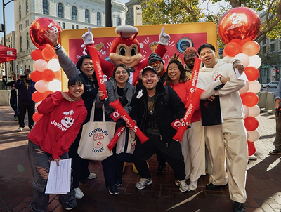 Customers celebrate at the grand opening of the new Jollibee location at 934 Market St. in downtown San Francisco on Friday, July 31, 2026. Both fans and first-time guests enjoyed lively music, free merch and photo ops with the brand's iconic Jolly Bee mascot. (Photo: Jollibee)
