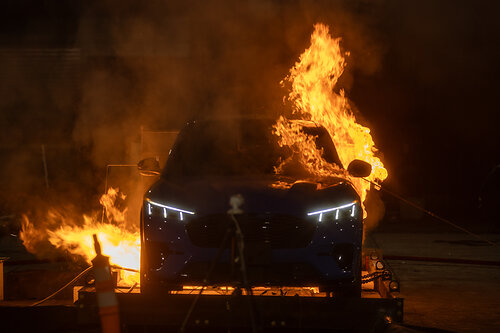 An electric vehicle burns during tests conducted by UL Research Institutes' Fire Safety Research Institute. 