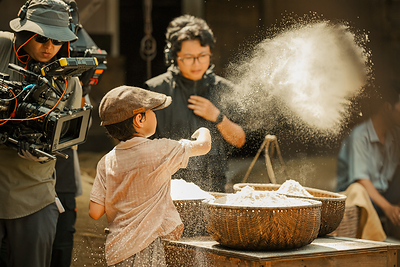 Nguyen Vu Uy Nhan films a scene as young Daniel during production of "Chrysalis" in Vietnam.