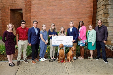 Gary Rome (third from left), president and CEO, Gary Rome Auto Group, Dr. Kala Frye Bourque, pediatric emergency physician, Baystate Health, Mandi Summers, safe kids coordinator, Baystate Health, Grace Mariani-Eurkus, pediatric social worker, Baystate Health, Dr. Matthew Di Guglielmo, pediatrician-and-chief, Baystate Children’s Hospital, Diana Chung-Edwards, injury prevention nurse coordinator, Baystate Health, Kathy Tobin, interim vice president of philanthropy, Baystate Health, Brandon Ramirez, director, corporate social responsibility, Hyundai Motor North America at Baystate Medical Center in Springfield, Mass. on Aug. 3, 2026 (Photo/Hyundai)