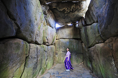 The Ishibutai Tumulus features a stone chamber built with over 30 massive stones. Visitors can go inside this unique structure. The Ishibutai Tumulus features a stone chamber built with over 30 massive stones. Visitors can go inside this unique structure.