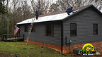 Gator Metal Roofing professionals installing the Sweepstakes winner's new metal roof.