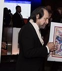 The Artist Guillermo Esparza at his Exhibition Opening Reception for National Down Syndrome Society, Times Square, NYC. Photo NDSS. All Rights Reserved.