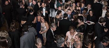 Attendees at Guillermo Esparza's Art Exhibition Opening Reception for National Down Syndrome Society at Times Square, NYC. Photo NDSS. All Rights Reserved.