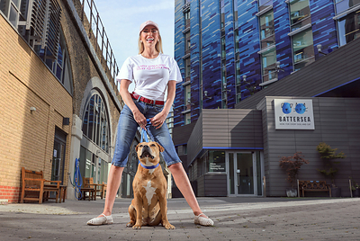 Faye Winter wears her slogan tee captioned ‘Hot girls just want healthy pets’, with Battersea dog Callie