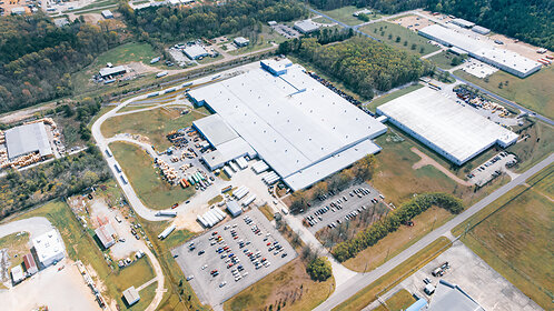 $256M investment will create 128 new jobs and add 380,000 sq. ft of manufacturing capacity.