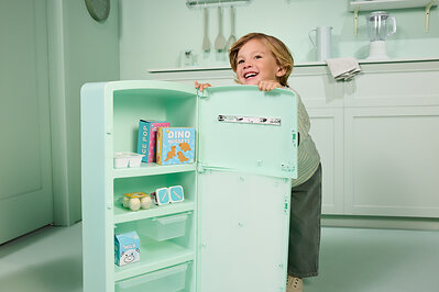Modular Kitchen Refrigerator, a vintage inspired role-play refrigerator that invites little ones to stock, sort and pretend with a dedicated fridge and freezer of their own and includes 20 food accessories.