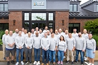 The RISE Commercial District team celebrates the company’s No. 854 ranking on the 2026 Inc. 5000 outside its Indianapolis headquarters.