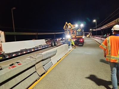 Crews install bypass lane on Southbound Span. First phase of two phase project to be completed by November 24, 2026
