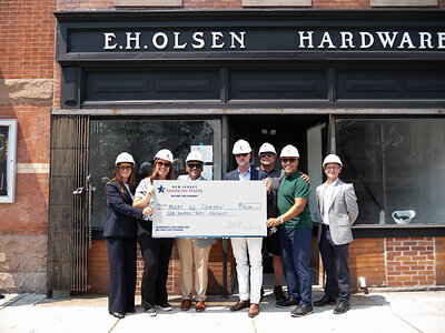 Left to right: Erin Banes, senior manager of external affairs, and Chelsea Kulp, director of communications and external affairs, New Jersey American Water; Carlos Morales, executive director, and John Martin, director of real estate development, Heart of Camden; Joseph Cerini, owner, Ed’s Contracting Services; David Goodman, operations manager, IDEA Center for the Arts; and Luke Santangelo, property and construction coordinator, Heart of Camden, pictured at 1811 Broadway, Camden, NJ.
