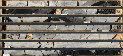 Photo 1: Grey Facies mineralization in TS25-003 laminated sphalerite and barite from 1,227.5 to 1,233.0 m