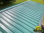 A completed Gator Metal Roofing installation in Forest Green.