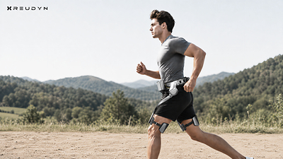 The Reudyn Hip X26 hip-assist exoskeleton shown during outdoor movement.