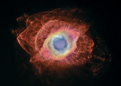 The Helix Nebula and the cosmic recycling of stellar material. The bright central nebula surrounds a white dwarf, the remnant of the star that created it. Farther out, newly revealed bow shocks show fragments of material cast off by that star colliding with surrounding interstellar gas. The fragments become progressively smaller and more disrupted as they are stripped, shredded and mixed into space. The new MOTHRA data are combined with previous data from the Hubble Space Telescope and the Kitt Peak 4m telescope to create this color image. Credit for the previous data: NASA, ESA, C. R. O’Dell (Vanderbilt University) and M. Meixner, P. McCullough and G. Bacon (Space Telescope Science Institute). Credit for the combination of MOTHRA, Hubble, and Kitt Peak data: Andrew McCarthy (andrew@cosmicbackground.io) The Helix Nebula and the cosmic recycling of stellar material. The bright central nebula surrounds a white dwarf, the remnant of the star that created it. Farther out, newly revealed bow shocks show fragments of material cast off by that star colliding with surrounding interstellar gas. The fragments become progressively smaller and more disrupted as they are stripped, shredded and mixed into space. The new MOTHRA data are combined with previous data from the Hubble Space Telescope and the Kitt Peak 4m telescope to create this color image. Credit for the previous data: NASA, ESA, C. R. O’Dell (Vanderbilt University) and M. Meixner, P. McCullough and G. Bacon (Space Telescope Science Institute). Credit for the combination of MOTHRA, Hubble, and Kitt Peak data: Andrew McCarthy (andrew@cosmicbackground.io)
