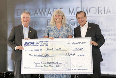 NJ Assemblyman David Bailey Jr. and NJ State Senator John Burzichelli show appreciation to Ms. Marta Smith for her status as the longest tenured Delaware Memorial Bridge E-ZPass Discount Plan holder from New Jersey