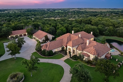 Luxury agent Clay Patterson joins top brokerage in Dallas-Fort Worth, and launches extreme estate in Aledo with sprawling stone home, private pond and nine acres of wow