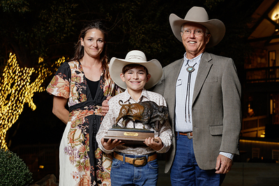 2025 Noble Land Stewardship Award recipients Meredith Ellis (left), her son G.C. Ellis (center) and G.C. Ellis, her father (left) of G Bar C Ranch, pose for a portrait during the inaugural Roots & Revelry event held in October 2025. Photo credit: Rob Mattson/Noble Research Institute