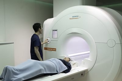 A patient undergoes a scan on a 3T MRI machine at Lifescan Imaging in Singapore.