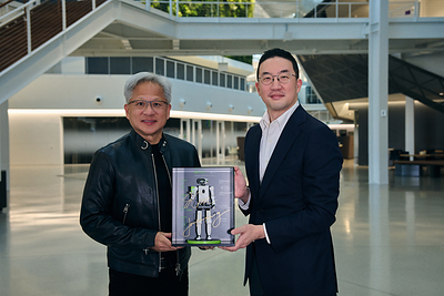 LG Corp. Chairman and CEO Kwang Mo Koo (right) and NVIDIA founder and CEO Jensen Huang (left) pose for a photo while holding a miniature humanoid robot at NVIDIA's headquarters in Santa Clara, California, on Aug. 13th. The robot presented by LG bears the autographs of LG Corp. Chairman and CEO Kwang Mo Koo and NVIDIA founder and CEO Jensen Huang.